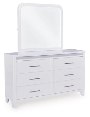 This dresser with mirror is a showstopper, bringing a touch of modern glamour to your sanctuary. A sleek white finish and inset glitter accents create a luxurious feel, while six spacious drawers provide ample storage for your wardrobe. The mirrorÐ²Ð‚â„¢s