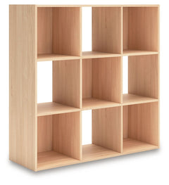 Keep clutter out from underfoot with this nine-cube organizer. The natural finish over replicated ash wood grain is warm and inviting, all while keeping your toys, knickknacks and other items stored away. The perfect marriage of style and function, this o