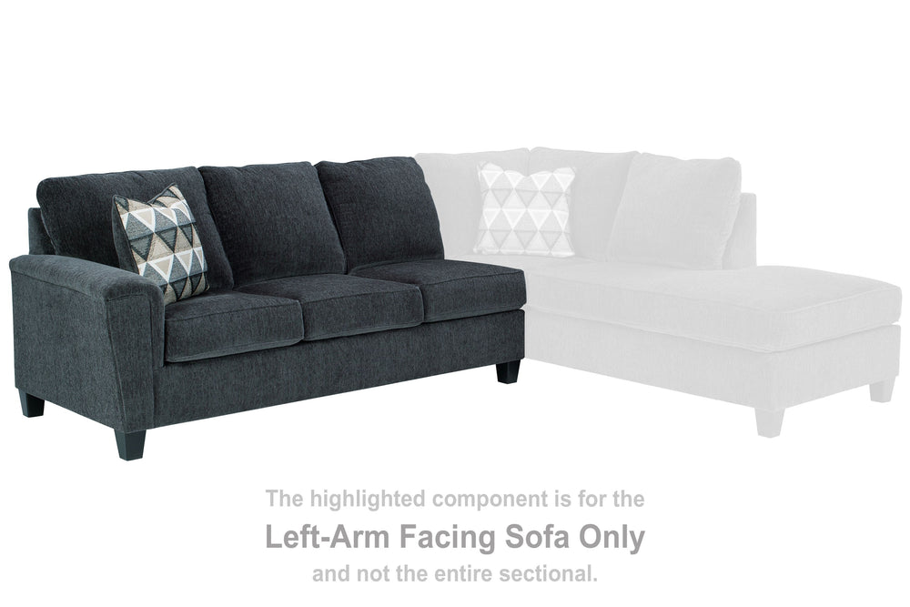 This left-arm facing sofa with corner wedge is made with polyester upholstery. Pairs with other items in the series to make a sectional.<br><br><b>Additional Dimensions</b><br><ul><li>Arm height: 27-"</li><li>Leg height: 4.5-"</li><li>Minimum width of doo
