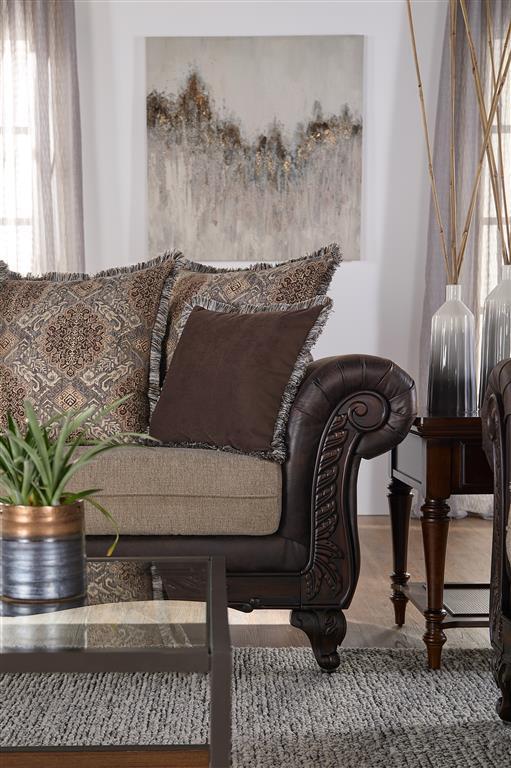  complete with carved enhancements across their fronts and the sofa-'s apron. The carvings continue on curvy feet
