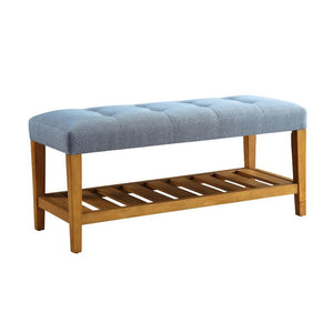 Simplistic lines pulling from the craftsman era and tapered legs to add some style, the Charla bench with button tufted full box seat can easily compliment any home styling Decor. The added width of the bottom slats serves as a function shelf. There are 4