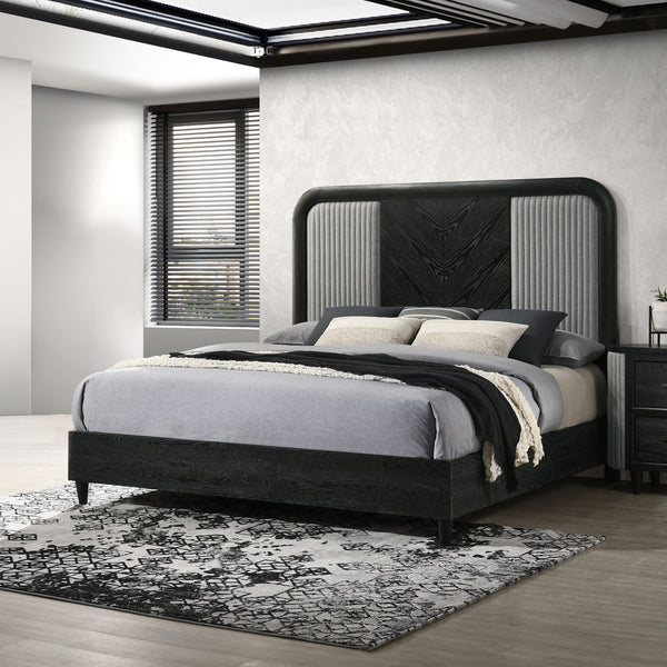 The Skyline Bed in Onyx fuses bold design with durability. Built from solid Rubberwood, engineered woods, and Ash Wood veneers, it withstands the test of time while exuding sophistication. The Onyx Black finish with gray glazing highlights the rich wood g