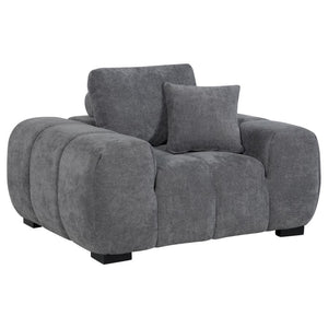 Transform your reading nook or living area into a haven of comfort with this mid-century inspired chair. Its wide, rounded arms and plush, tufted waterfall seat invite you to relax, while soft, neutral upholstery enhances its cozy appeal. A durable frame 
