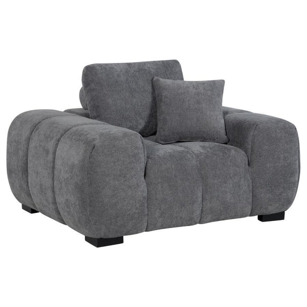 Transform your reading nook or living area into a haven of comfort with this mid-century inspired chair. Its wide, rounded arms and plush, tufted waterfall seat invite you to relax, while soft, neutral upholstery enhances its cozy appeal. A durable frame 