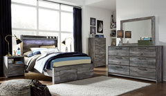 Rest in the beachy style of this bedroom group. Its driftwood and surfer-inspired smoky finish and cool LED lighting give this bed a rustic look that-'s perfect for creating an island oasis. Keeping everything neat and tidy, two smooth-gliding drawers pro
