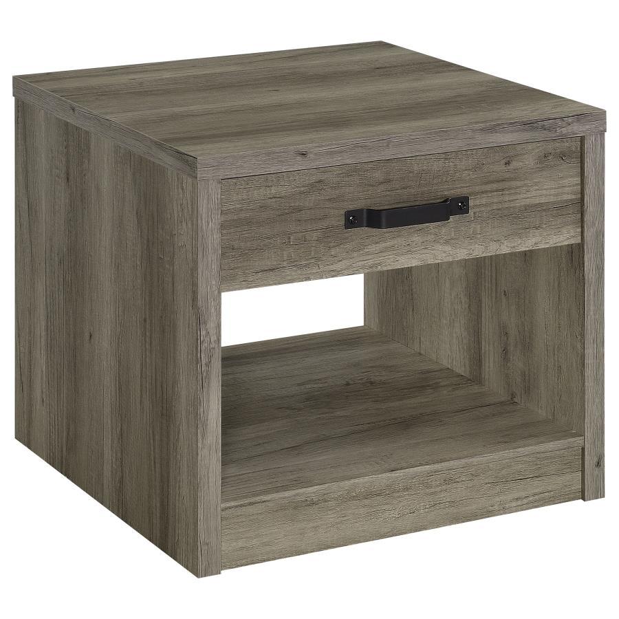Bring rustic charm to your living room or bedroom with this versatile end table. Featuring a weathered gray finish over engineered wood and scratch-resistant veneer, it delivers a natural wood-look design. The table includes a spacious drawer with a bold 