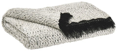 Ultra-plush softness and cozy warmth make this throw nice to have around the house. Flirty black fringe and soft chenille merge a sumptuous soft feel with a richly artisan sense of style.<br/><br/><b>Product Features</b><ul><li>Made of polyester/chenille 
