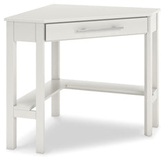 Clean-lined design takes center stage with the Otaska home office corner desk. Well-suited to small spaces, this desk leaves a small footprint as it seamlessly fits into corners. A center storage drawer keeps essentials close, while the crisp white finish