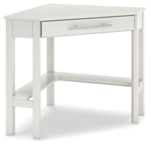 Clean-lined design takes center stage with the Otaska home office corner desk. Well-suited to small spaces, this desk leaves a small footprint as it seamlessly fits into corners. A center storage drawer keeps essentials close, while the crisp white finish
