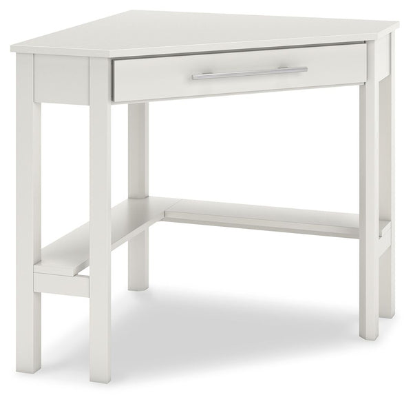 Clean-lined design takes center stage with the Otaska home office corner desk. Well-suited to small spaces, this desk leaves a small footprint as it seamlessly fits into corners. A center storage drawer keeps essentials close, while the crisp white finish