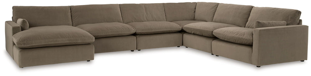Find yourself inspired by elevated yet functional style. This sectional with chaise balances ultra-soft seating with a clean-cut appearance. Its modular design caters to your needs, whether youâ€™re making space for guests or setting up a cozy family movi