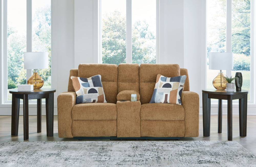 Indulgent comfort meets fashion-forward flair in this reclining loveseat with console. Its luxuriously soft upholstery and captivating color show off your cozy yet smart style. Sleek track arms infuse a modern sensibility, while the striking accent pillow