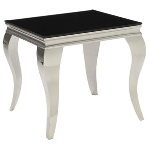 This end table exudes modern glam with a tempered beveled glass top and polished stainless steel cabriole legs. The reflective finish and gracefully curved Queen Anne style legs deliver timeless elegance and a majestic ambiance, perfect for elevating refi