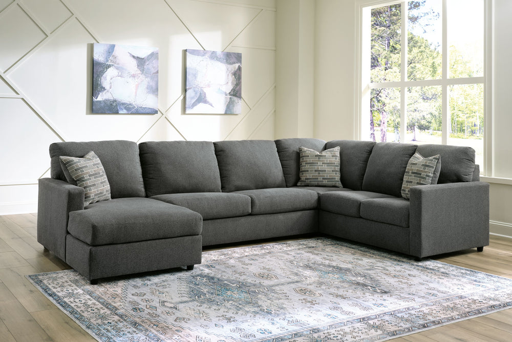 Contemporary fashion, meet superior form. This sectional with chaise is strikingly streamlined with its track arms. Cozy cushions invite superior relaxation, while handsome charcoal upholstery speaks to tried-and-true modern color palettes. Simply kick ba