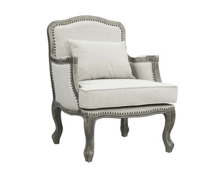  the Tania sofa flaunts a French cabriole silhouette that perches on graceful cabriole legs and showcases its antique-inspired profile. The nailhead trim accents give this piece a moder