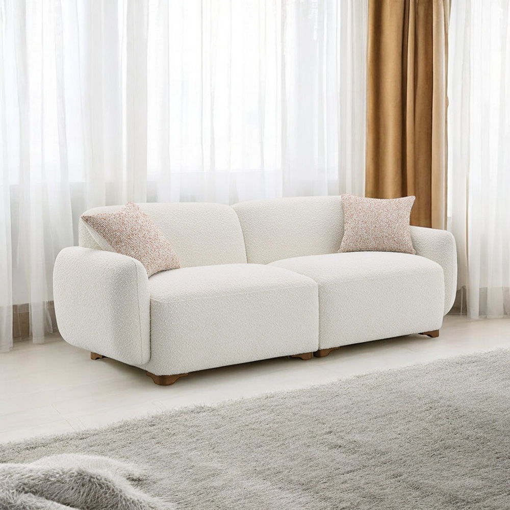 Step into a world of sophisticated comfort with the Darius Collection Sofa Set, beautifully upholstered in luxurious Boucle fabric. This exquisite set, with its soft, textured finish and plush cushioning, invites you to sink into relaxation and unwind in 