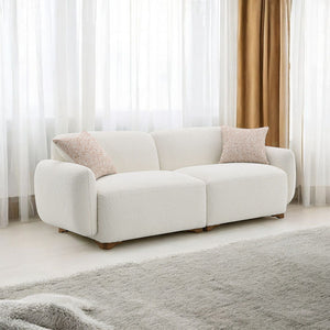 Step into a world of sophisticated comfort with the Darius Collection Sofa Set, beautifully upholstered in luxurious Boucle fabric. This exquisite set, with its soft, textured finish and plush cushioning, invites you to sink into relaxation and unwind in 