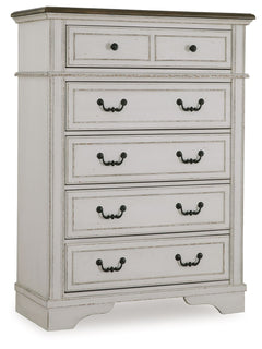 Traditional design. Casual appeal. You can have it all with this chest of drawers. A relaxed two-tone aesthetic merges with ornate profiled drawer fronts and pilasters to give the distinctive piece an allure all its own. Expansive drawers with quality dov
