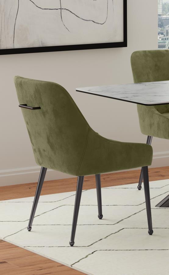 Cradle yourself in the embrace of opulence with this Italian style modern dining side chair, where comfort meets sophistication. Its plated metal legs, tapering into geometric spheres, create a foundation that-'s as sturdy as it is striking. The seat, a h