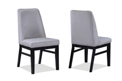 This dining set is a sophisticated blend of contemporary design and artistic flair, ideal for modern homes seeking a touch of elegance. The set features a sleek, round table with a faux marble top that is both beautiful and easy to care for. The table-'s 