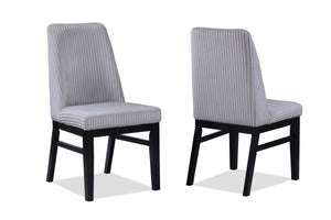 This dining set is a sophisticated blend of contemporary design and artistic flair, ideal for modern homes seeking a touch of elegance. The set features a sleek, round table with a faux marble top that is both beautiful and easy to care for. The table-'s 