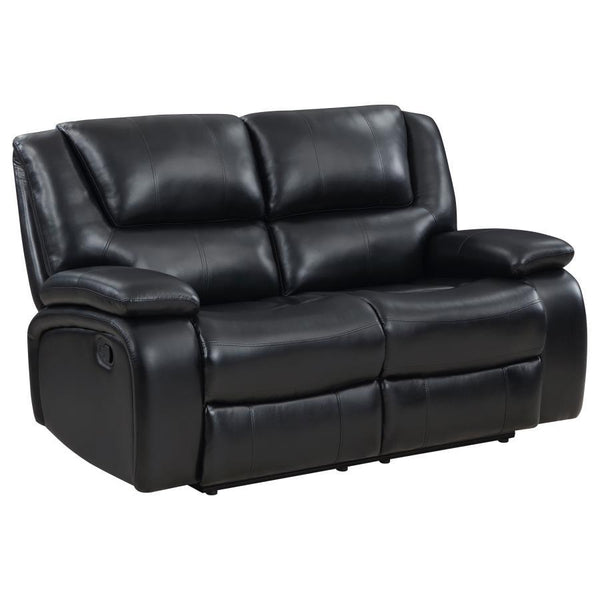 Bold black leatherette upholstery offers the look of luxurious leather with easy-care maintenance as the motion loveseat is versatile and beautiful. Living rooms, family rooms, and media venues become comfort zones with the plump feel and clean design of 