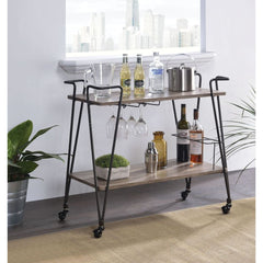Perfect for entertaining, this Paulsen serving cart will be an impressive piece during your next party. A spacious top and bottom shelf provide ample room for kitchen necessities, sturdy legs in black copper finish have casters for mobility, and shelves c