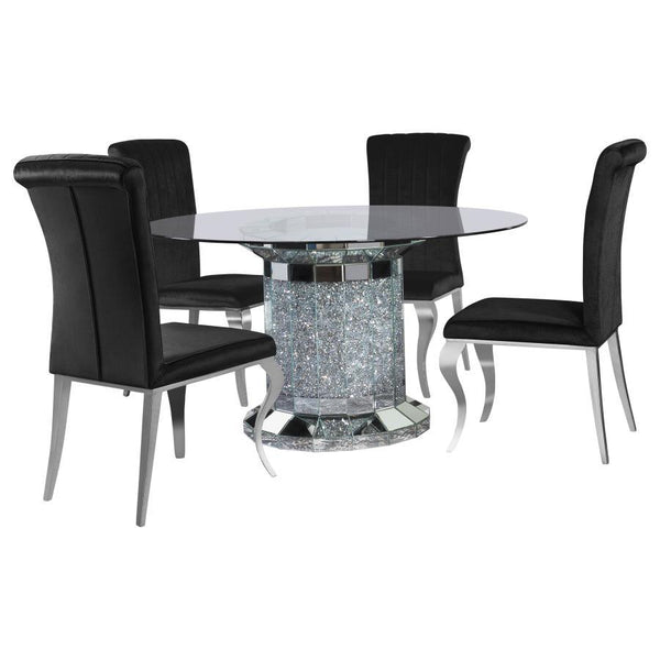 Invite over a few guests to celebrate at this modern glam dining table. A round, clear glass top reveals the scintillating column-inspired pedestal frame beneath, offering an open and airy look. Sparkling faux diamonds are encrusted within the base for a 