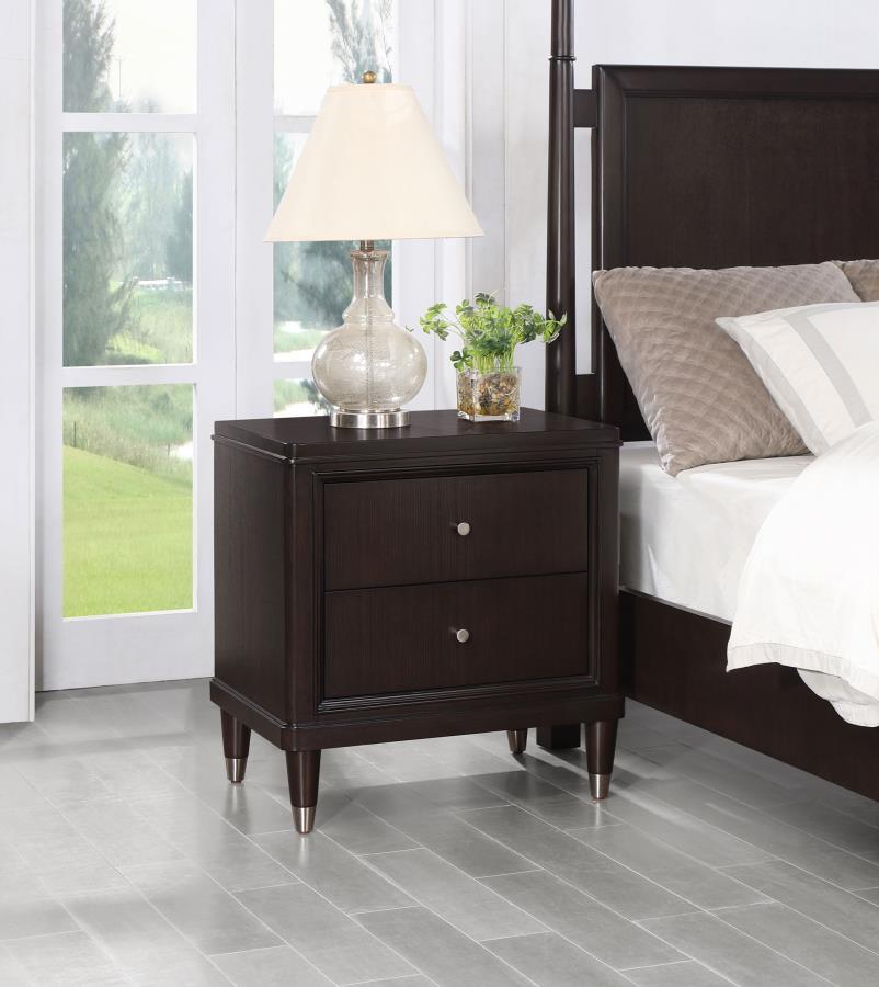 Accentuate bedroom decor with the chic look and impressive functionality of a modern two-drawer nightstand. Its sleek look is accentuated with delicate trim and petite round knobs on each drawer. A dark brown finish ensures a versatile palette, complement