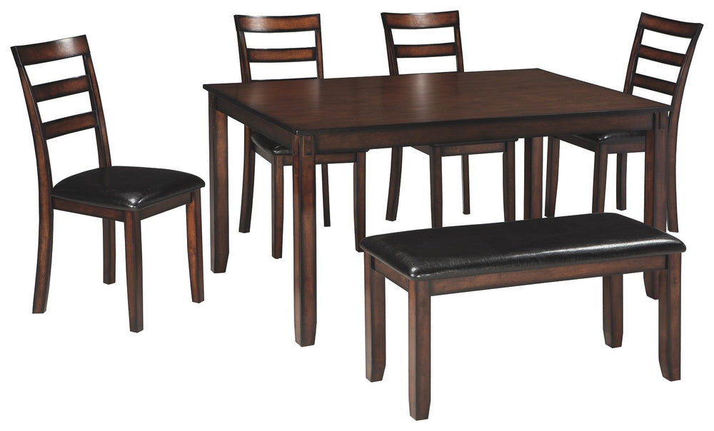Feast your eyes on how beautiful simplicity can be. This dining room table setâ€™s wonderfully clean-lined profile is dramatically enriched with a complex, burnished finish loaded with tonal variation and rustically refined character. Upholstered ladderba