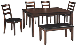 Feast your eyes on how beautiful simplicity can be. This dining room table setâ€™s wonderfully clean-lined profile is dramatically enriched with a complex, burnished finish loaded with tonal variation and rustically refined character. Upholstered ladderba