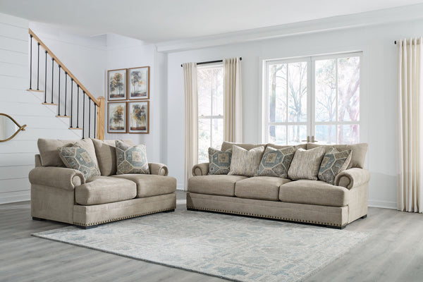 Looking to enhance your home-'s visual appeal? This sofa and loveseat set offers sophisticated design, comfort and elegance with tonal colors, roll arms and nailhead accents. Enjoy optimal coziness as you nestle into luxurious soft upholstery and feather-