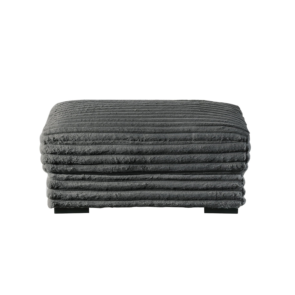 The Embrace Ottoman in charcoal gray is the perfect addition to your living space, offering both style and functionality. Crafted from 100% charcoal gray polyester fabric with a plush, blanket-like texture, it promises ultimate relaxation. This versatile 