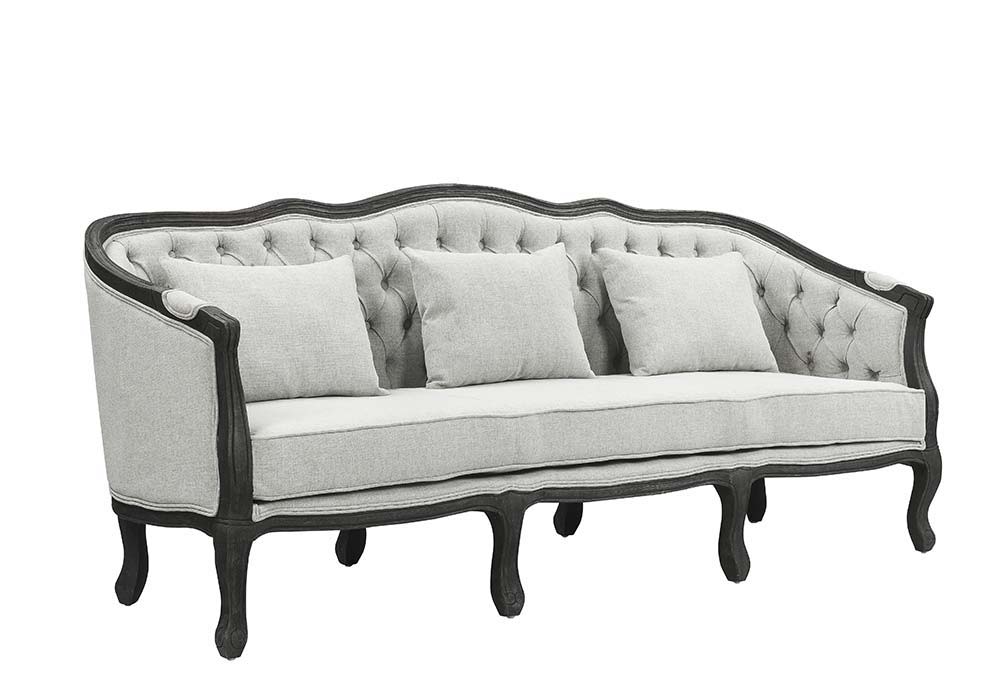 With a nod to vintage French design, the Samael is a modern interpretation of a camel-back sofa is distinguished by its exposed, and beautifully carved, wooden frame that wraps you in comfort. Its curved frame with a winding front rail sits off the floor 