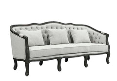 With a nod to vintage French design, the Samael is a modern interpretation of a camel-back sofa is distinguished by its exposed, and beautifully carved, wooden frame that wraps you in comfort. Its curved frame with a winding front rail sits off the floor 