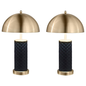 Bold and sculptural, this matching set of dome table lamps blends quilted texture with a sleek metallic finish. The rounded dome shades cast warm downward light, perfectly balanced atop cylindrical black bases wrapped in a quilted pattern for added depth.
