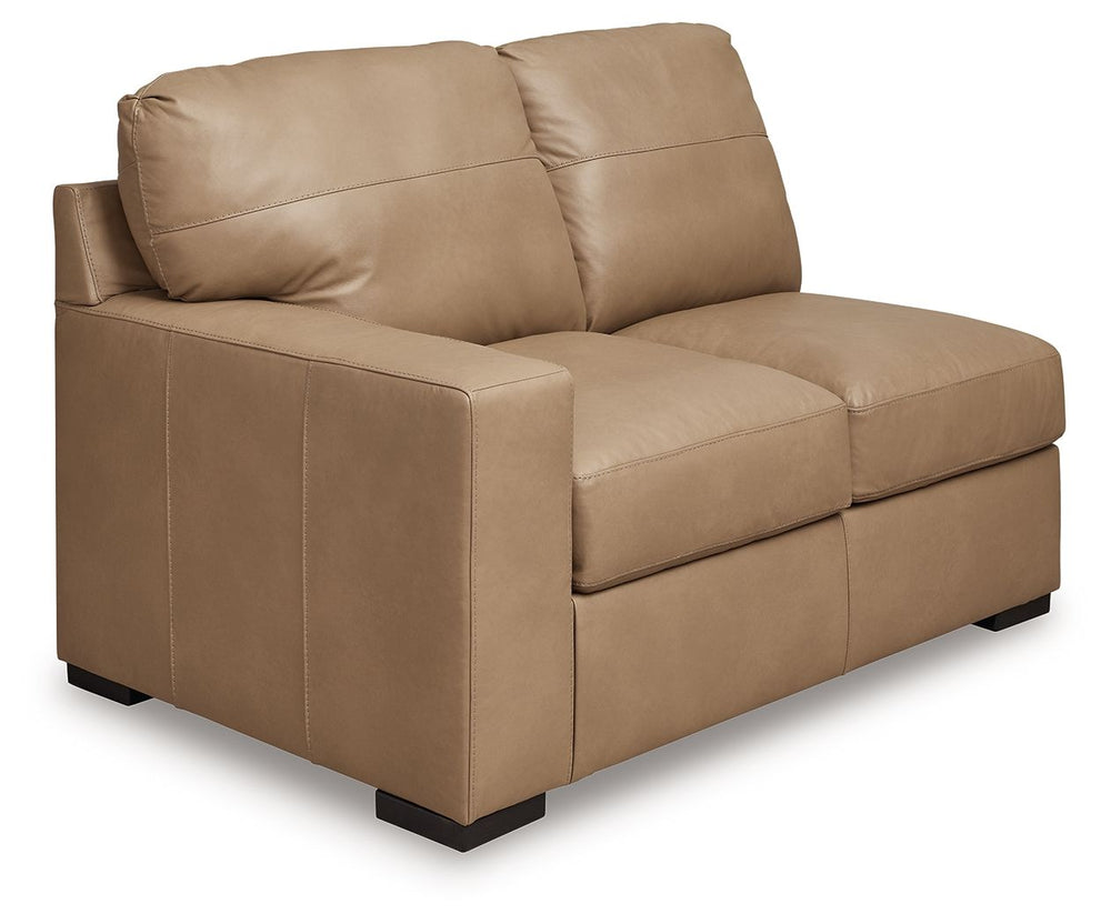 This left-arm facing loveseat is made with a combination of 100% top grain leather and faux leather upholstery. Pairs with other items in the series to make a sectional.<br><br><b>Additional Dimensions</b><br><ul><li>Arm height: 26-"</li><li>Seat depth: 2