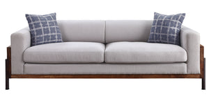  comfortable seats wrapped in a high shelter backrest in a beautiful walnut finish