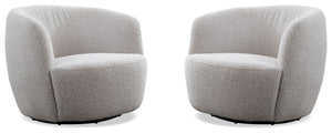 This swiveling accent chair updates your living room with a playful, modern look. It-'s made with a kiln-dried solid pine wood frame with a streamlined barrel silhouette. The design features a curved back with foam padding and a seat bolstered with sinuou