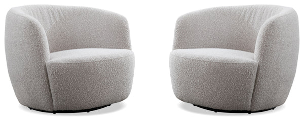 This swiveling accent chair updates your living room with a playful, modern look. It-'s made with a kiln-dried solid pine wood frame with a streamlined barrel silhouette. The design features a curved back with foam padding and a seat bolstered with sinuou