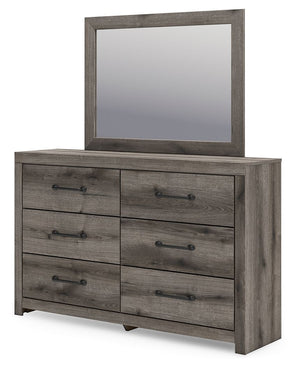  from clothes to bed linens. Elongated drawer pulls in a dark hue polish of