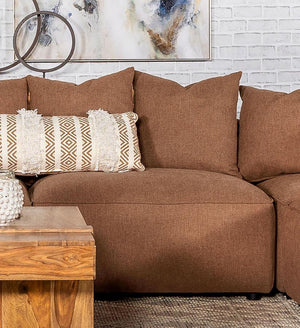  upholstered in a soft terracotta trillium polyester blend fabric across its tailored tight back