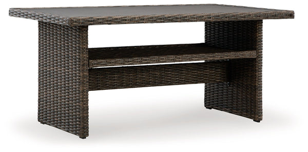 Relax. Refresh. Refine your outdoor oasis. This multi-use table masters high style with beautiful simplicity. A handy shelf for storage, warmly neutral hues and all-weather durability invite everyday use. From chic gatherings with guests to dinner by the 