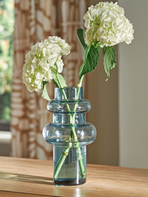  the statement-making accentâ€”crafted from blown glass in a blue hueâ€”rounds out your modern decor beautifully.<br/><br/><b>Product Features</b><ul><li>Made of b