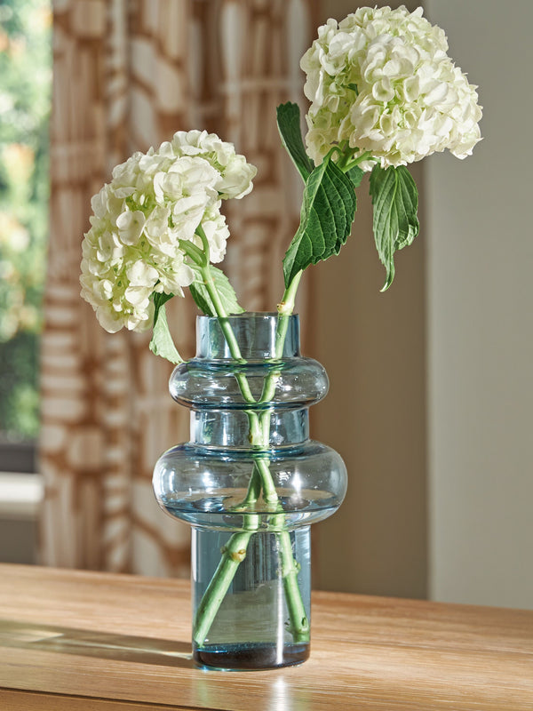  the statement-making accentâ€”crafted from blown glass in a blue hueâ€”rounds out your modern decor beautifully.<br/><br/><b>Product Features</b><ul><li>Made of b