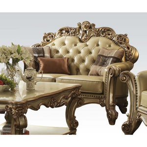 Tracing back to the classical Baroque era, expressed with intent and conviction, our new interpretation of Vendome is donned. Vendome loveseat-'s faux leather upholstery is grand and classy with crystal like button tufting on the back in a crackled gold p