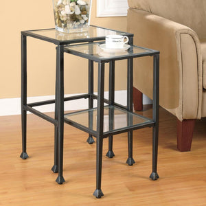 modern design with clear tempered glass tops and shelves. The black powder-coated metal frame ensures durability and stability while enhancing the contemporary look of your living space. Perfect for compact