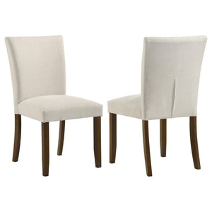 Upgrade your dining table with the fresh silhouettes and contemporary flair of this set of two modern side chairs. Each boasts an armless profile and lovely upholstery that creates the perfect touch of texture. Foam cushions provide exemplary comfort, per