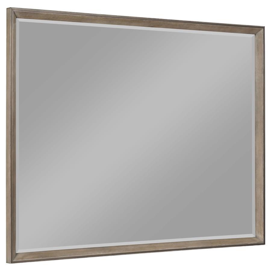 This framed dresser mirror adds a touch of modern sophistication to your bedroom. The Taupe oak finish complements a variety of decor styles, providing a neutral yet stylish accent. Its clean-lined frame echoes the mitered trim of the dresser, creating a 