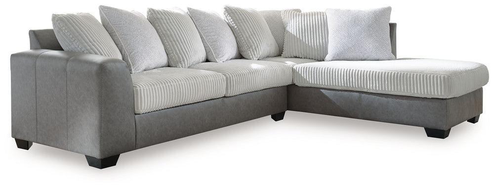 You want your living room to reflect your ultra-cool character. Introducing: this sectional with chaise. Its combination of retro-cool jumbo cord and sleek faux leather takes a unique approach to contemporary aesthetics. For a finishing touch, pillows pro